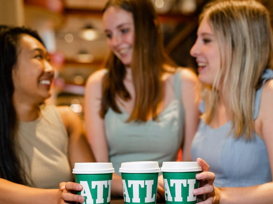 Georgia Tech students drinking coffee in Midtown Atlanta.