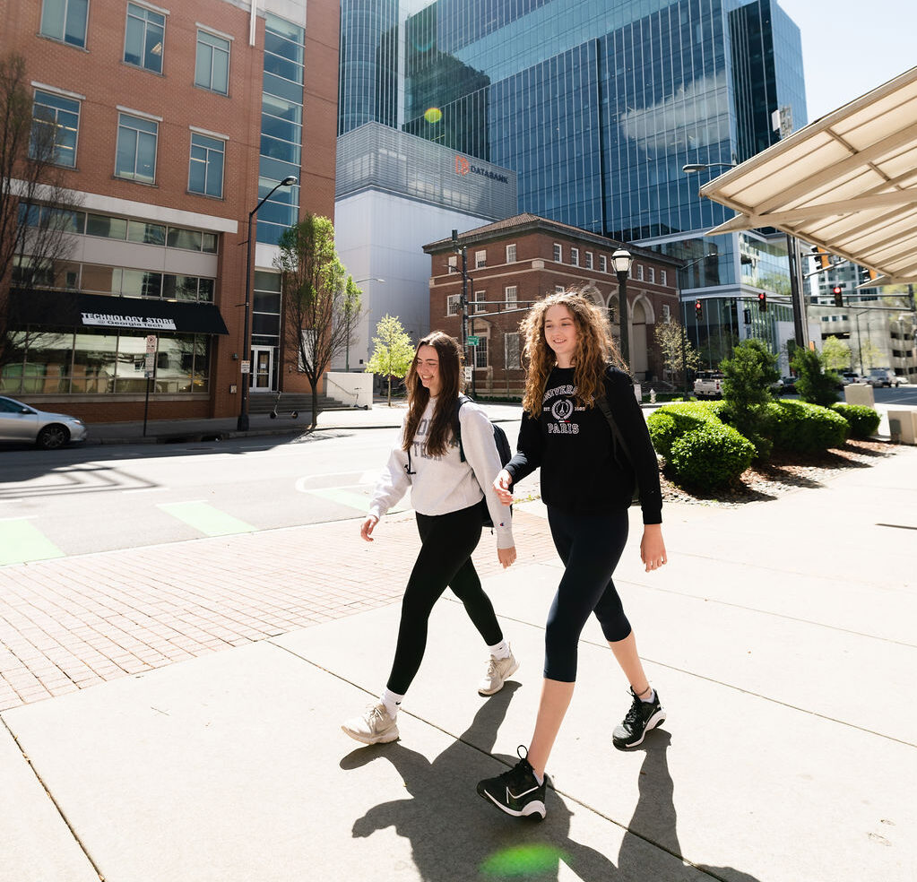 Georgia Tech students walking together in Tech Square