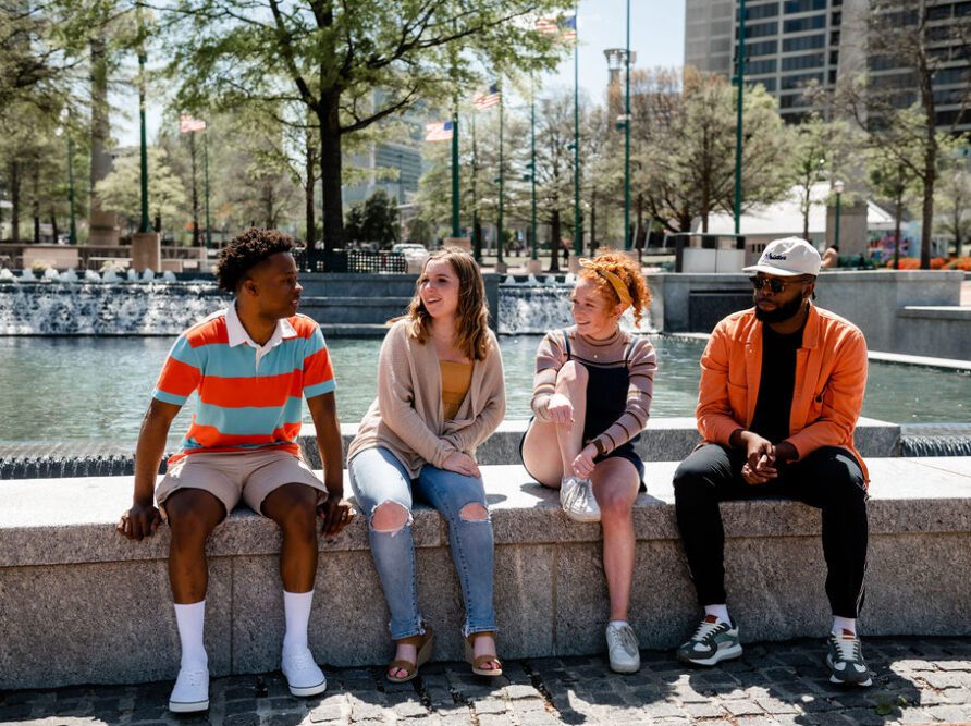 Georgia Tech students sitting in Midtown Atlanta.