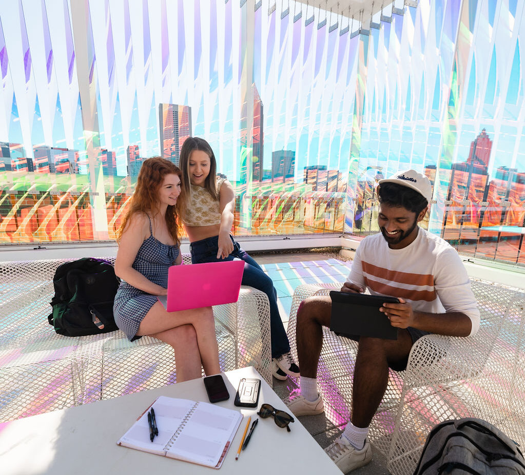 Students studying together on the top deck of Crosland Tower.