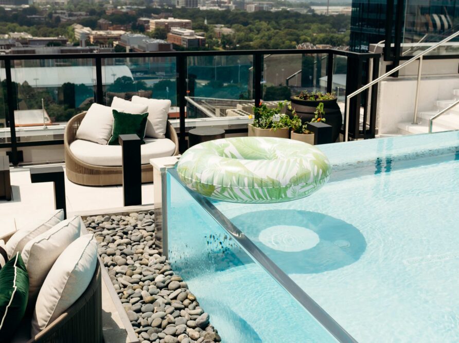 Whistler pool with floatie and views of Midtown Atlanta