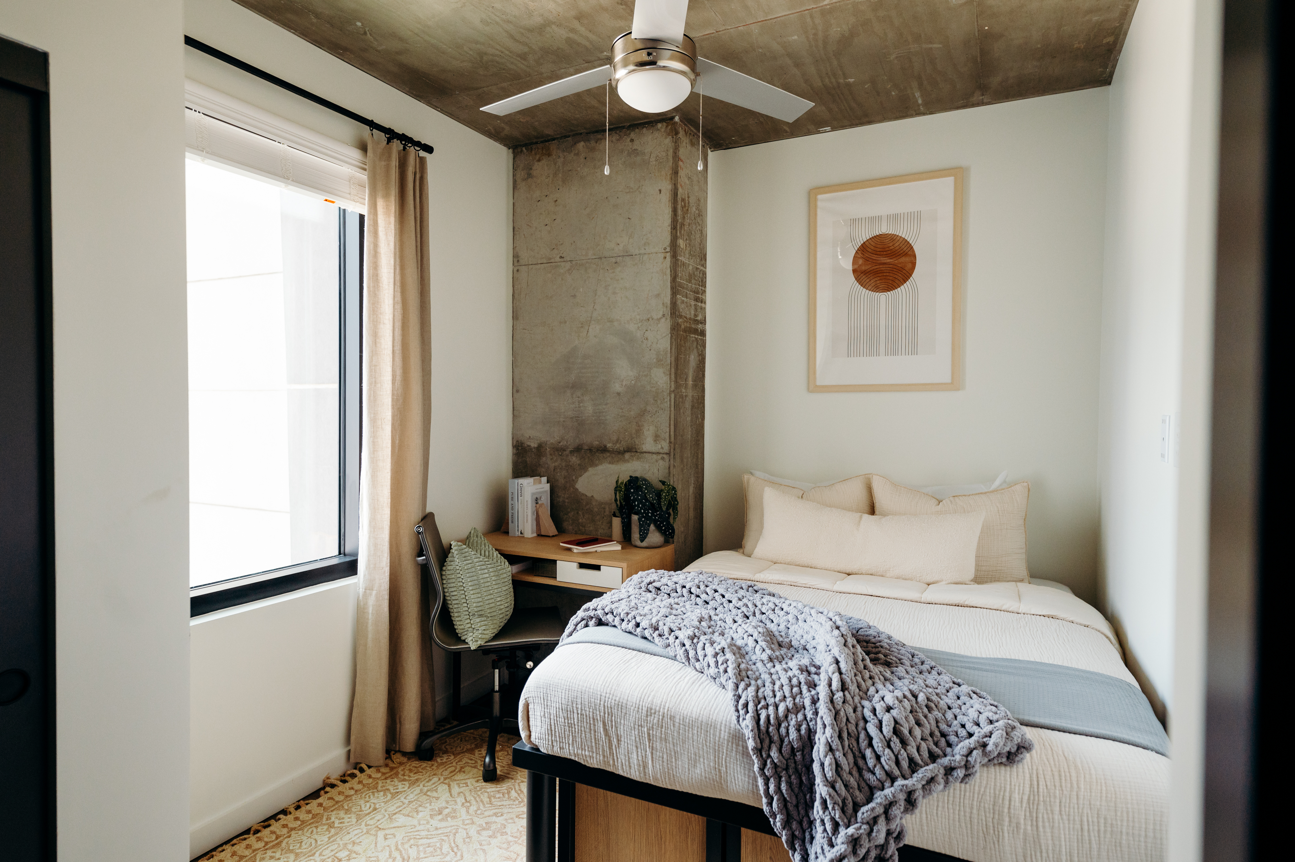 Image of the interior of a bedroom at Whistler, a midtown student housing apartment in Atlanta.
