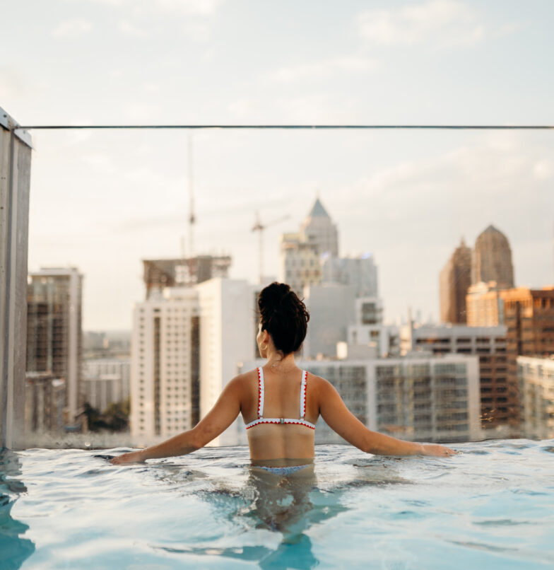 Resident at the rooftop pool at Whistler Student Apartments in Midtown Atlanta