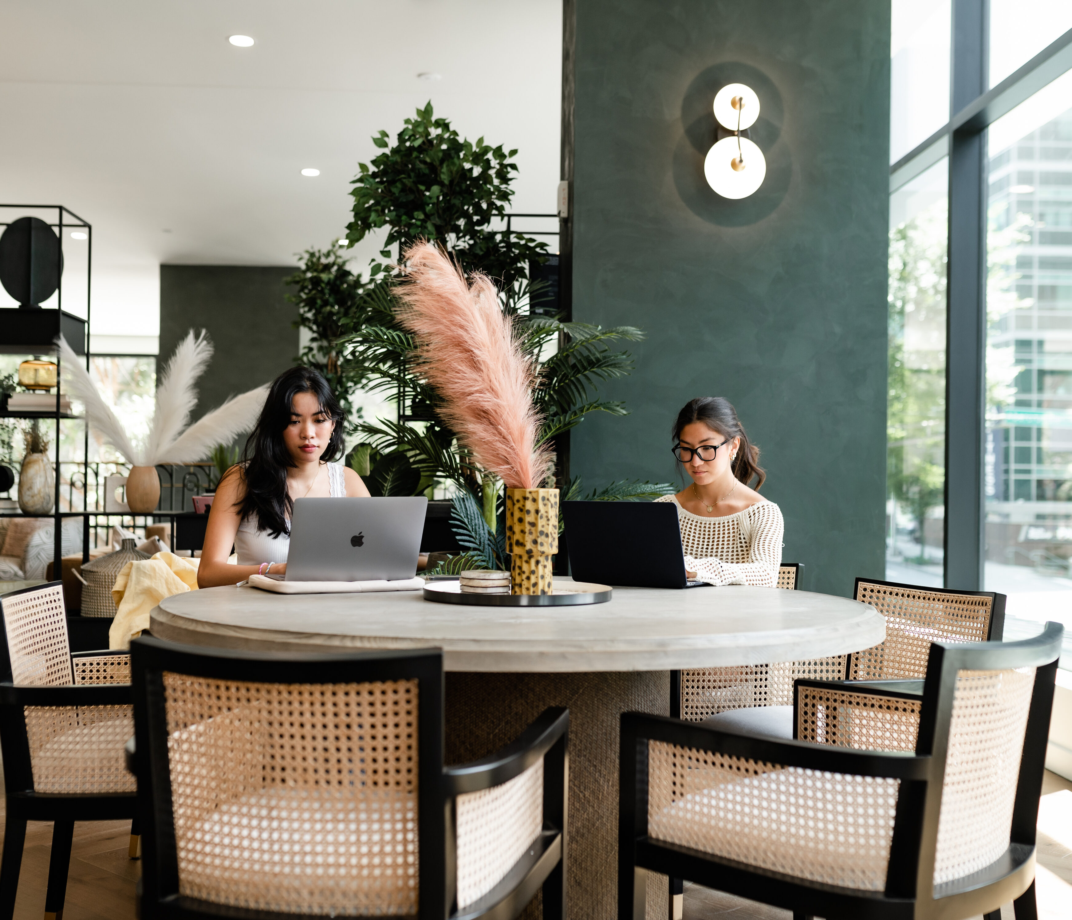 Two residents studying in study lounge at Whistler, a student property in Midtown Atlanta