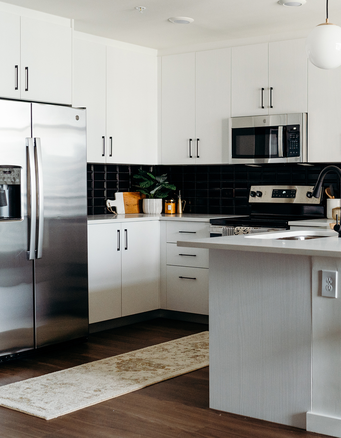 A kitchen with stainless-steel appliances