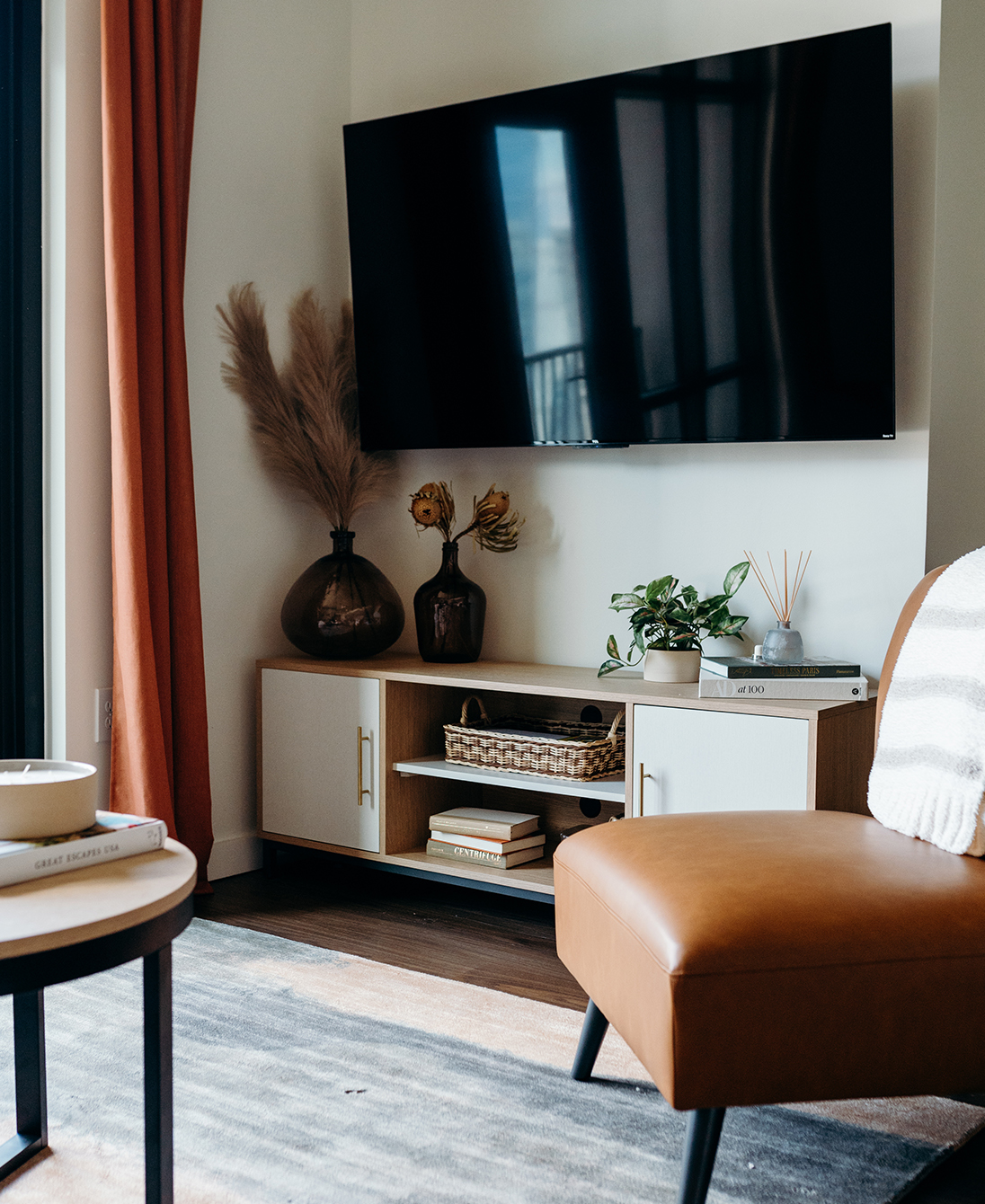 A living room with a TV